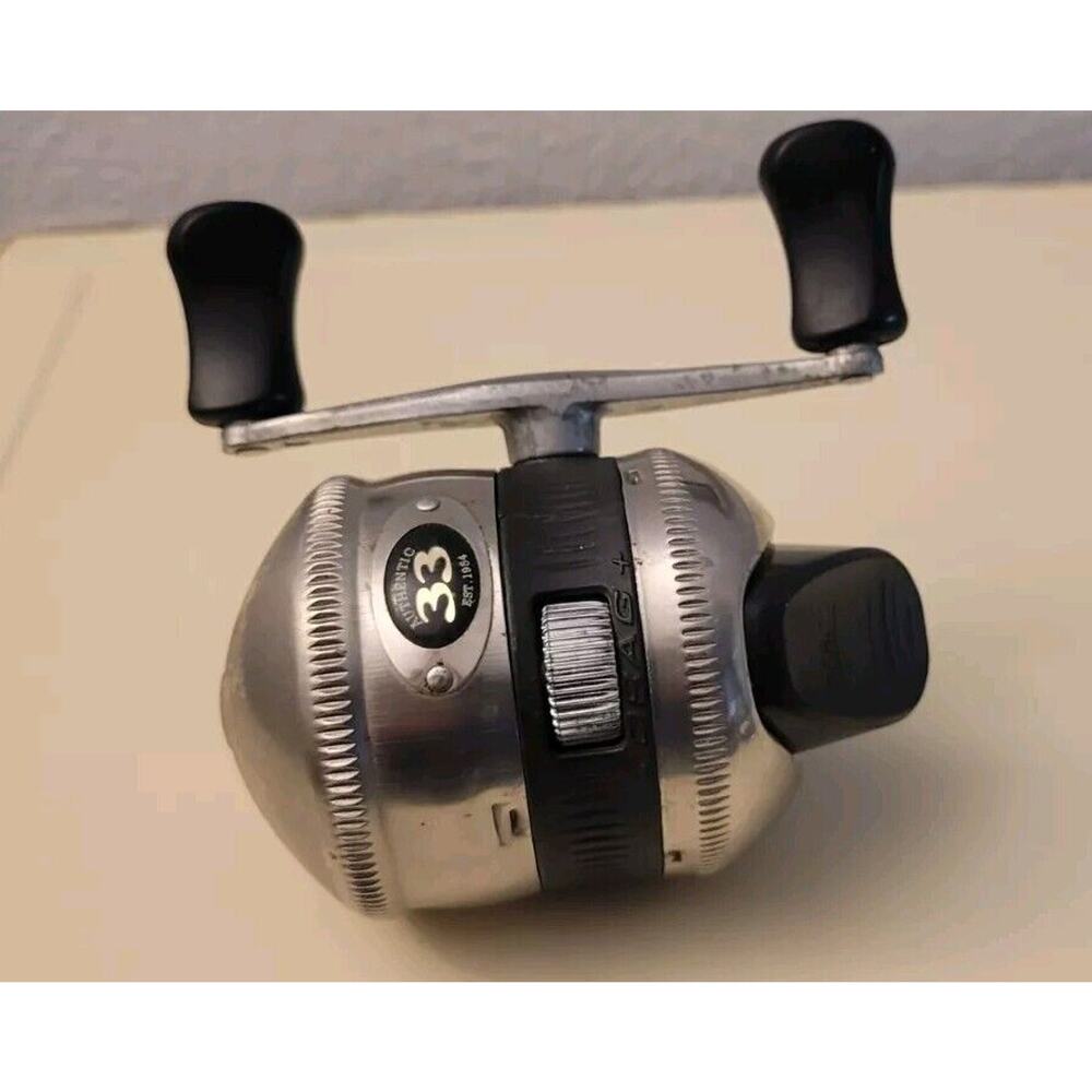 Zebco 33 Vtg. Silver Push Button Casting Reel Authentic 33J-CKB3